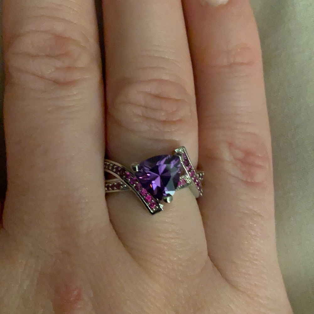 Purple trillion cut crossover ring